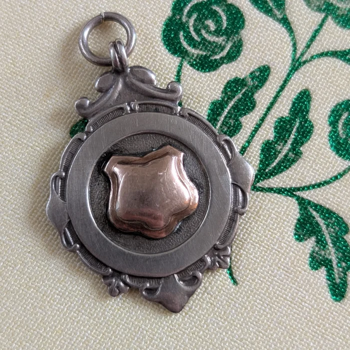 Antique Sterling Silver and Rose Gold Accent Medal Fob